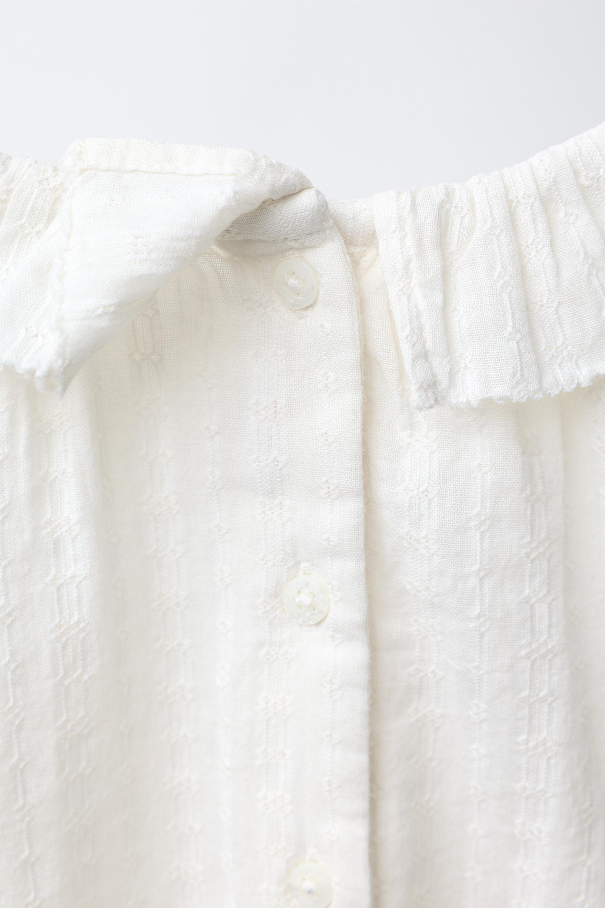 EMBROIDERED FAGOTING BODYSUIT